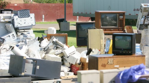 Professional team performing office clearance in Upminster