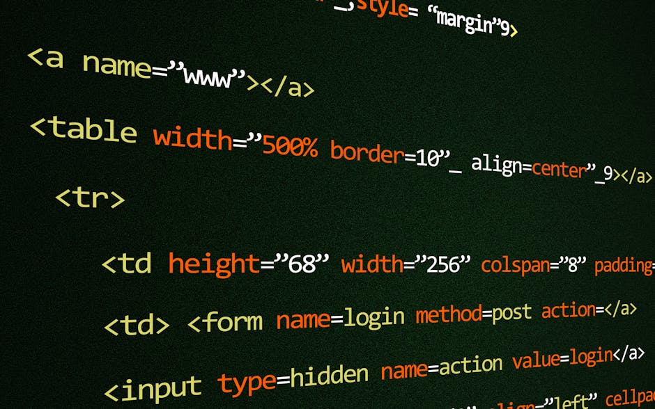 The image shows a close-up of a computer screen displaying lines of HTML code with tags, attributes, and values in various colours, including yellow, red, and white, set against a dark green backgroun
